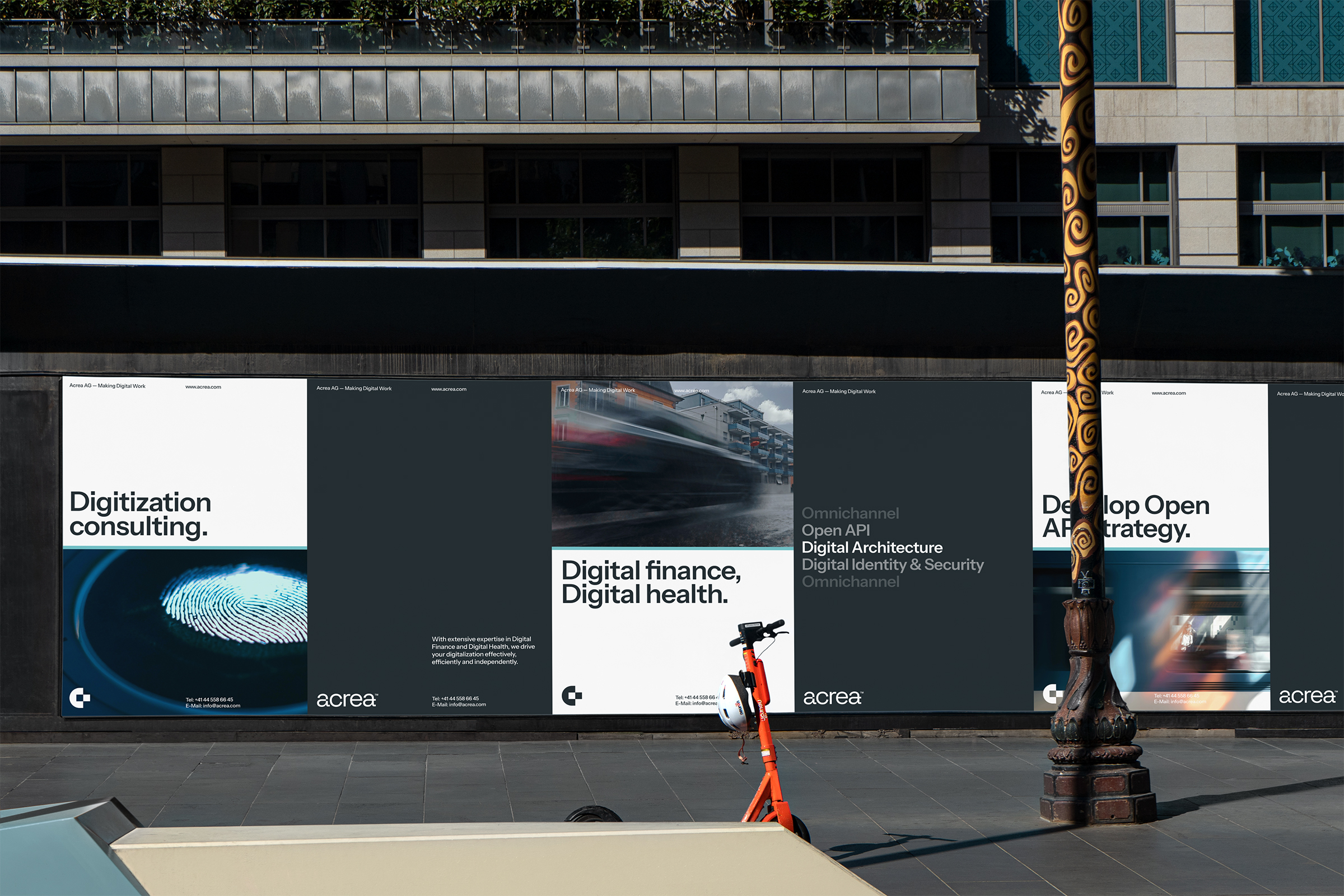 Acrea posters on a street wall